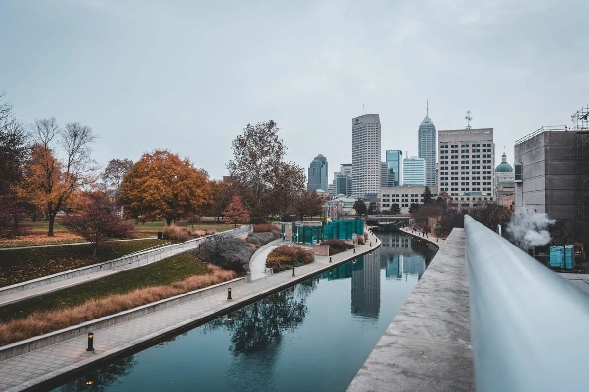 The downtown Indianapolis canal walk lined with autumn trees